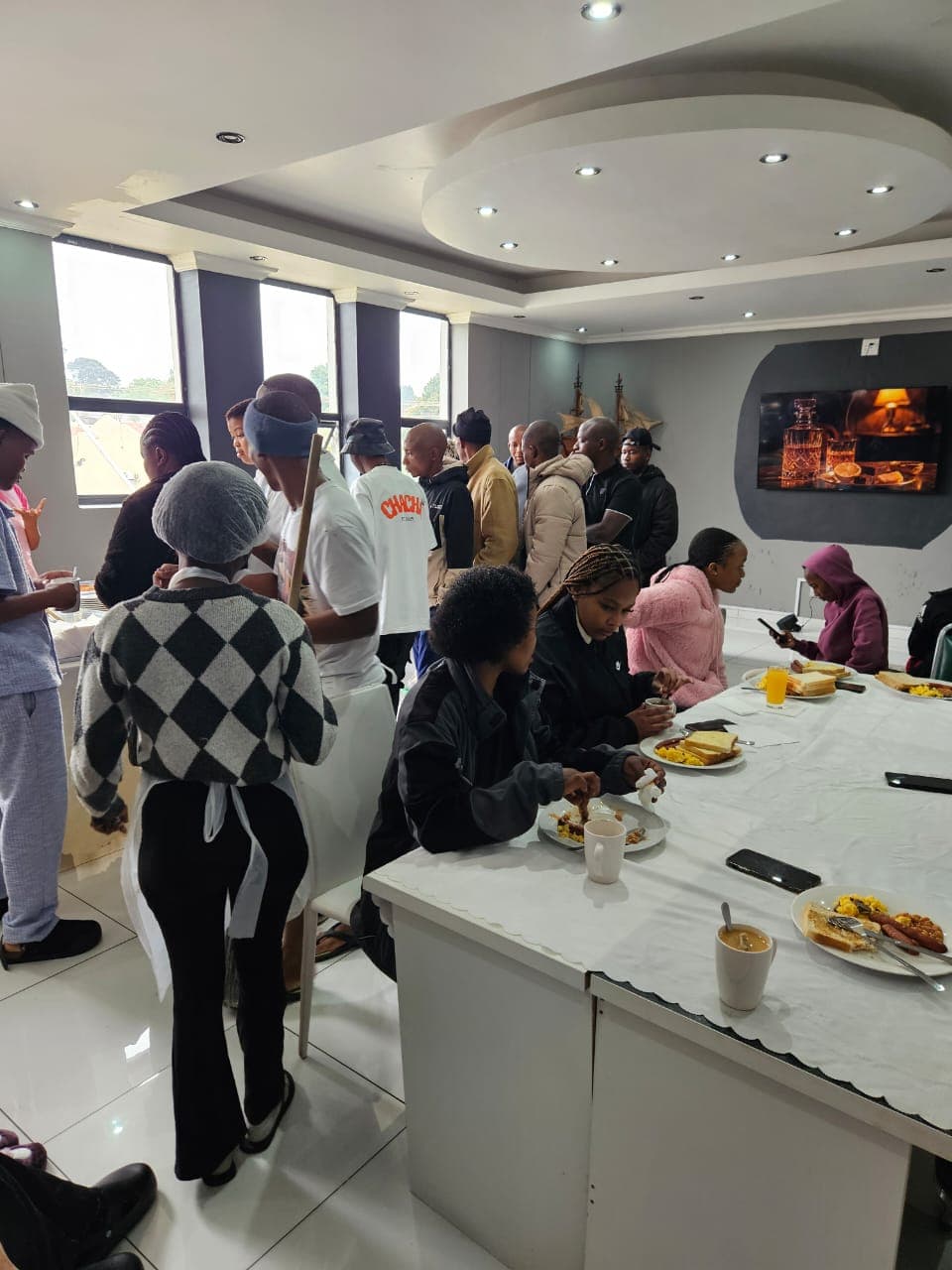 Morning breakfast buffet service with dedicated hotel staff