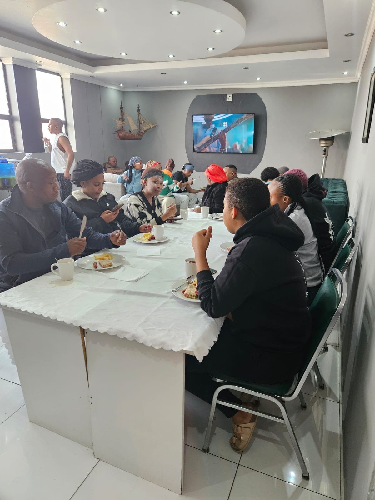 Social breakfast dining atmosphere for hotel guests